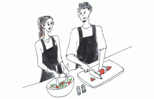 男性と女性が一緒に料理をしてサラダを作っているイラスト