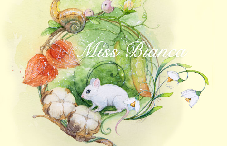 白い美しいネズミと植物