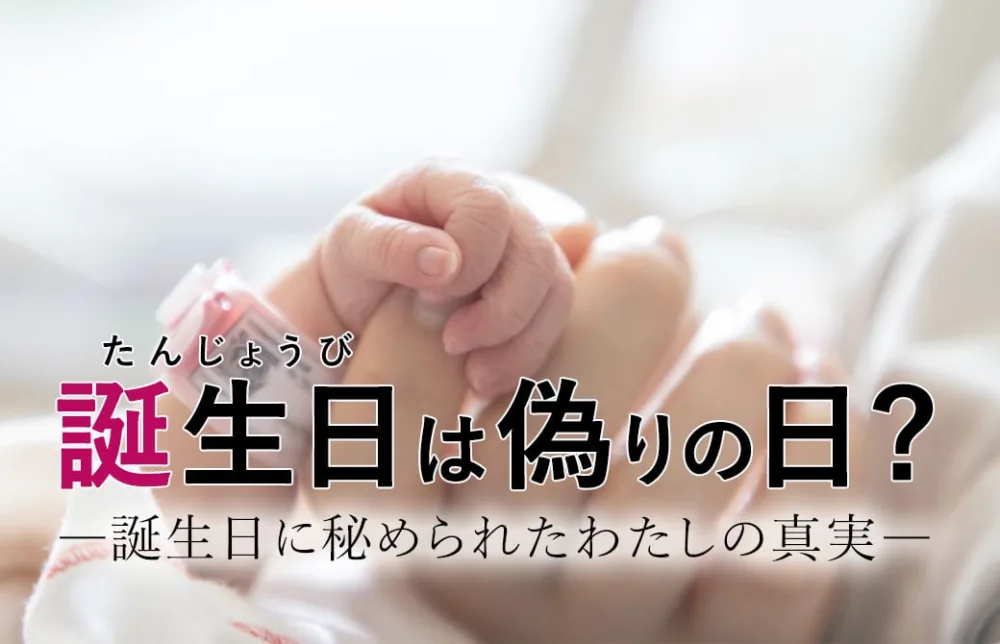 赤ちゃんがお母さんの指を握っている