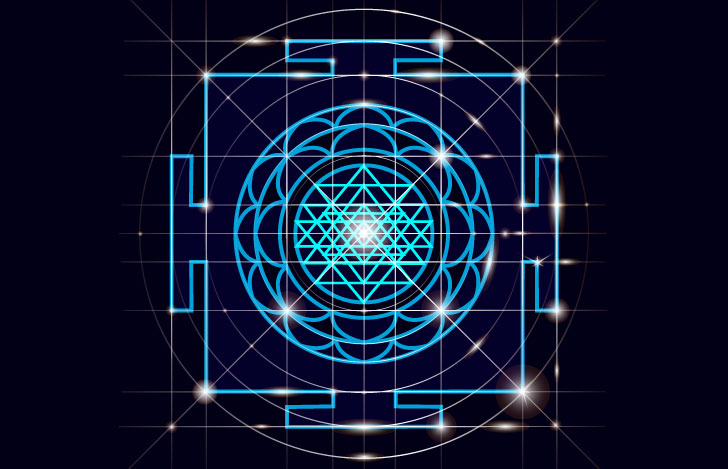 黒い背景に浮かび上がるヤントラの図