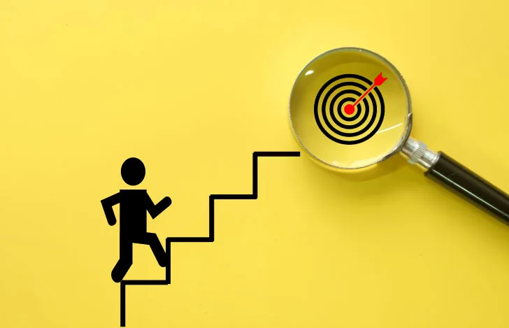 ゴールをイメージした虫眼鏡と人と階段のイラスト